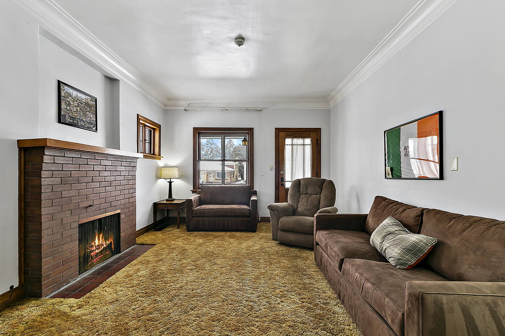 312 Gage Road Riverside, IL 60546 - Photo 4 of 26 a living room with furniture and a fireplace