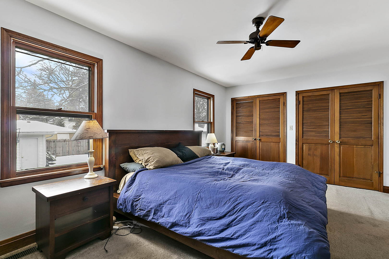 312 Gage Road Riverside, IL 60546 - Photo 7 of 26 a bedroom with a large bed and a large window