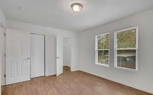 an empty room with windows