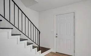 a view of entryway with wooden floor