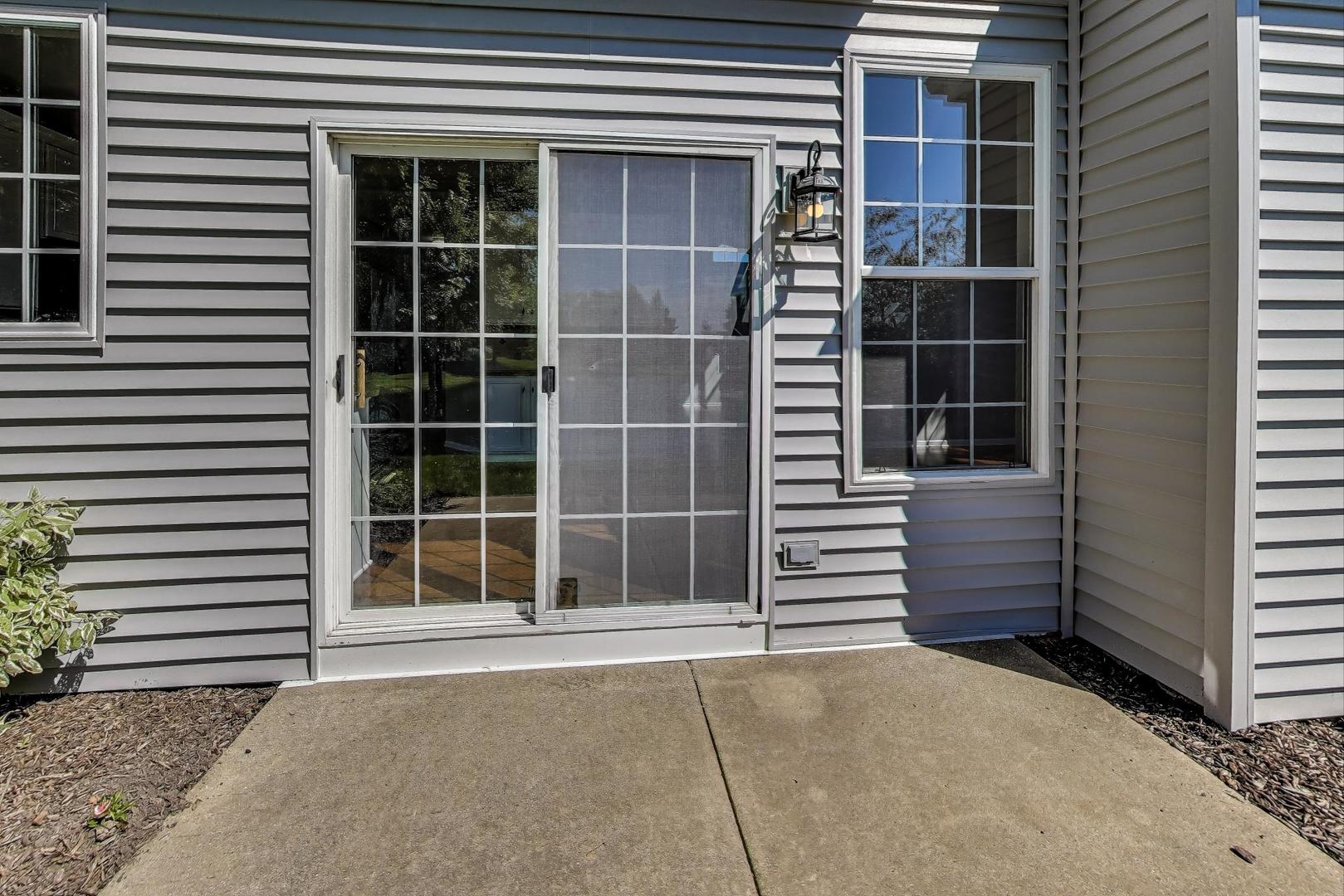383 Cascade Lane Oswego, IL 60543 - Photo 30 of 35 a view of front door with outdoor space