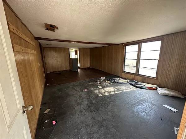 an empty room with windows