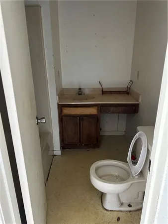 a bathroom with a sink and a toilet