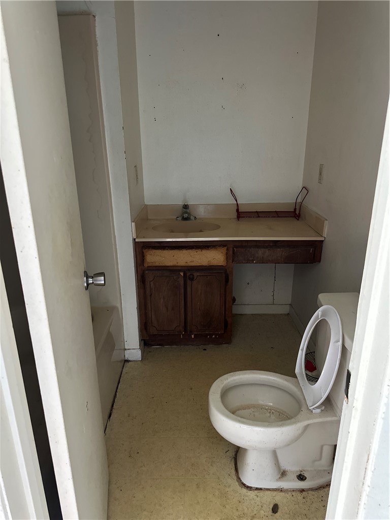 510 James Street Refugio, TX 78377 - Photo 8 of 9 a bathroom with a sink and a toilet