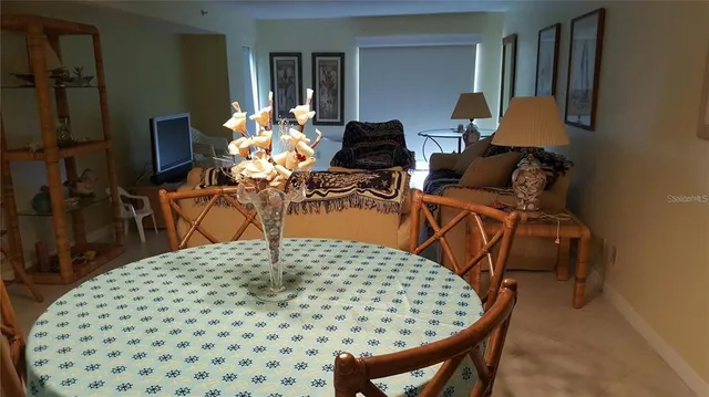 a view of a bathroom with a shower and a sink