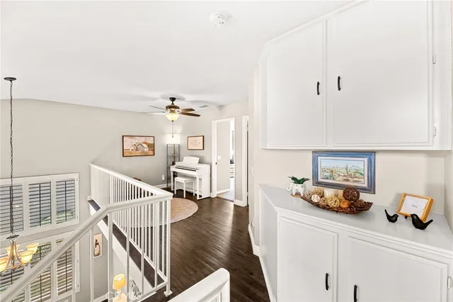 a view of a porch with furniture and a yard