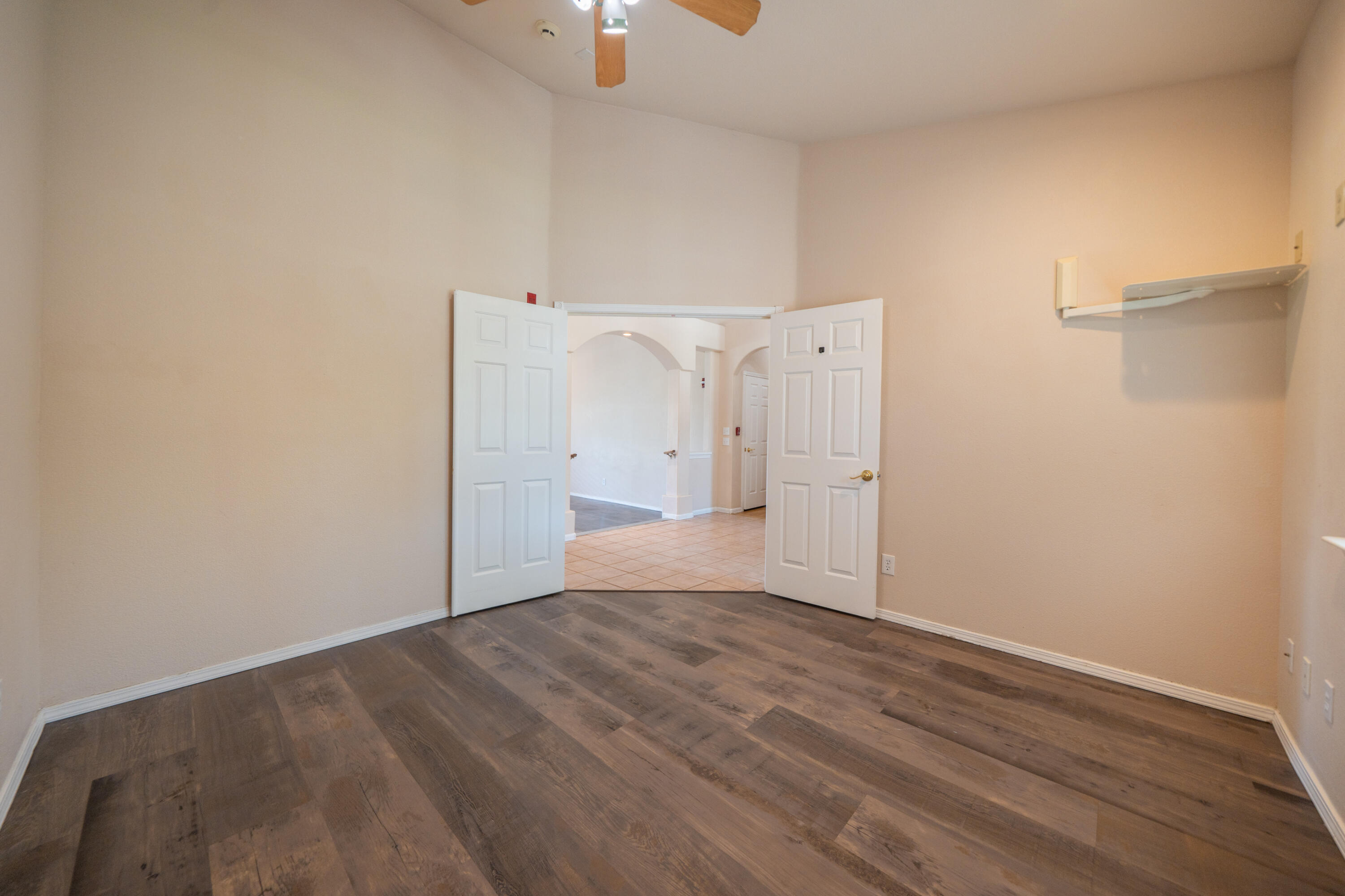 3438 Showboat Court Redding, CA 96003 - Photo 23 of 63 a view of empty room with wooden floor
