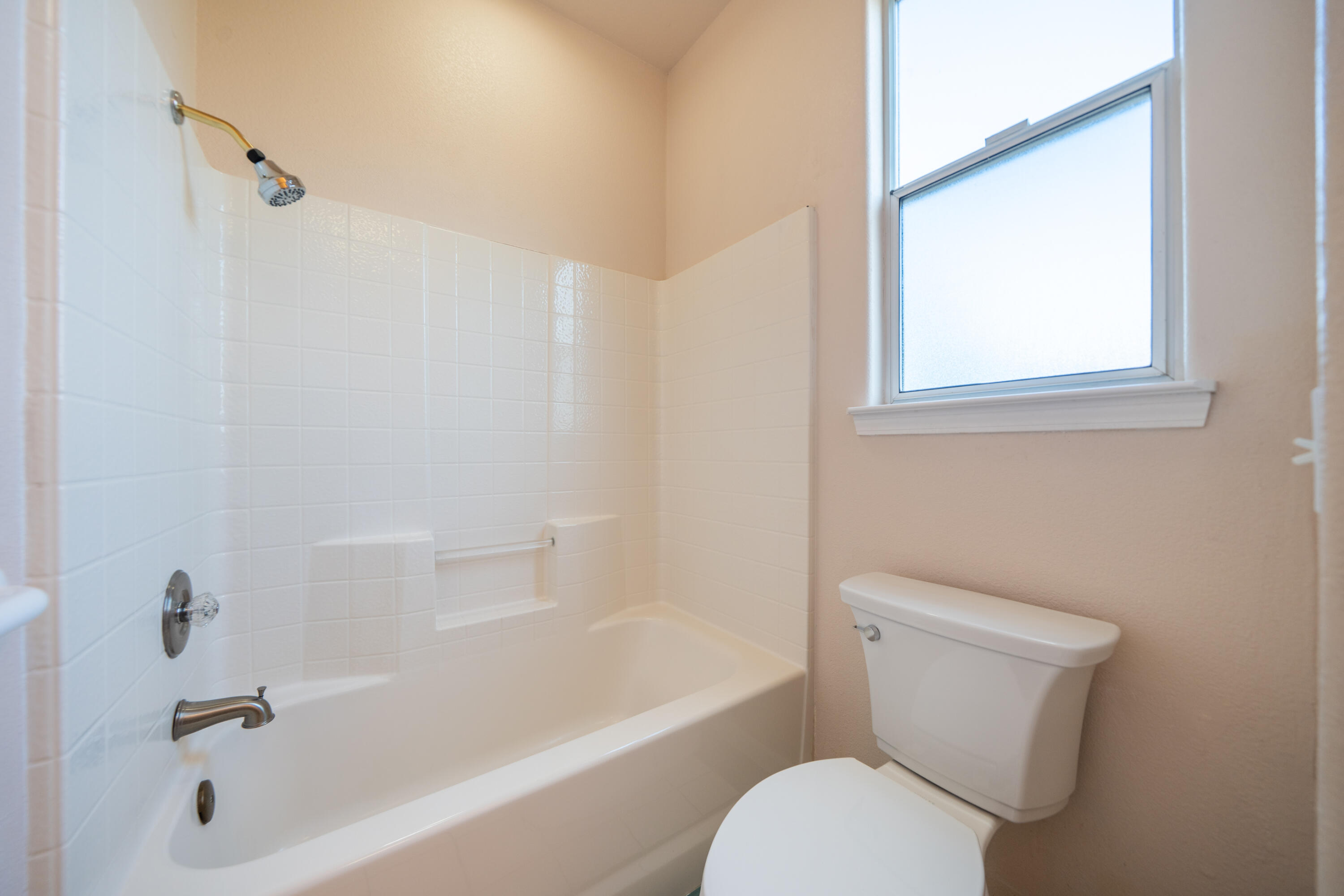 3438 Showboat Court Redding, CA 96003 - Photo 29 of 63 a white toilet sitting next to a bath tub