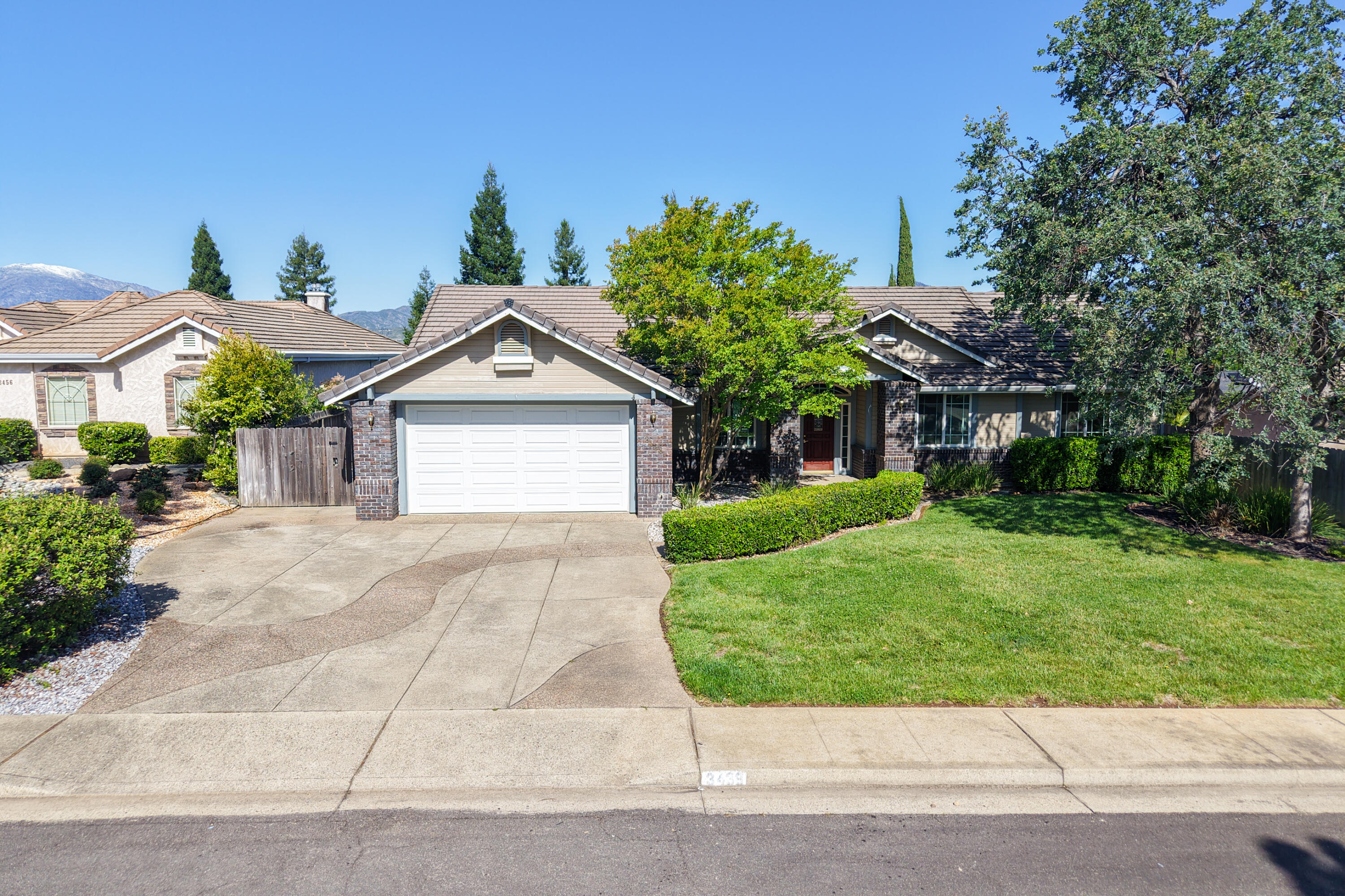 3438 Showboat Court Redding, CA 96003 - Photo 57 of 63 a view of front a house with a yard