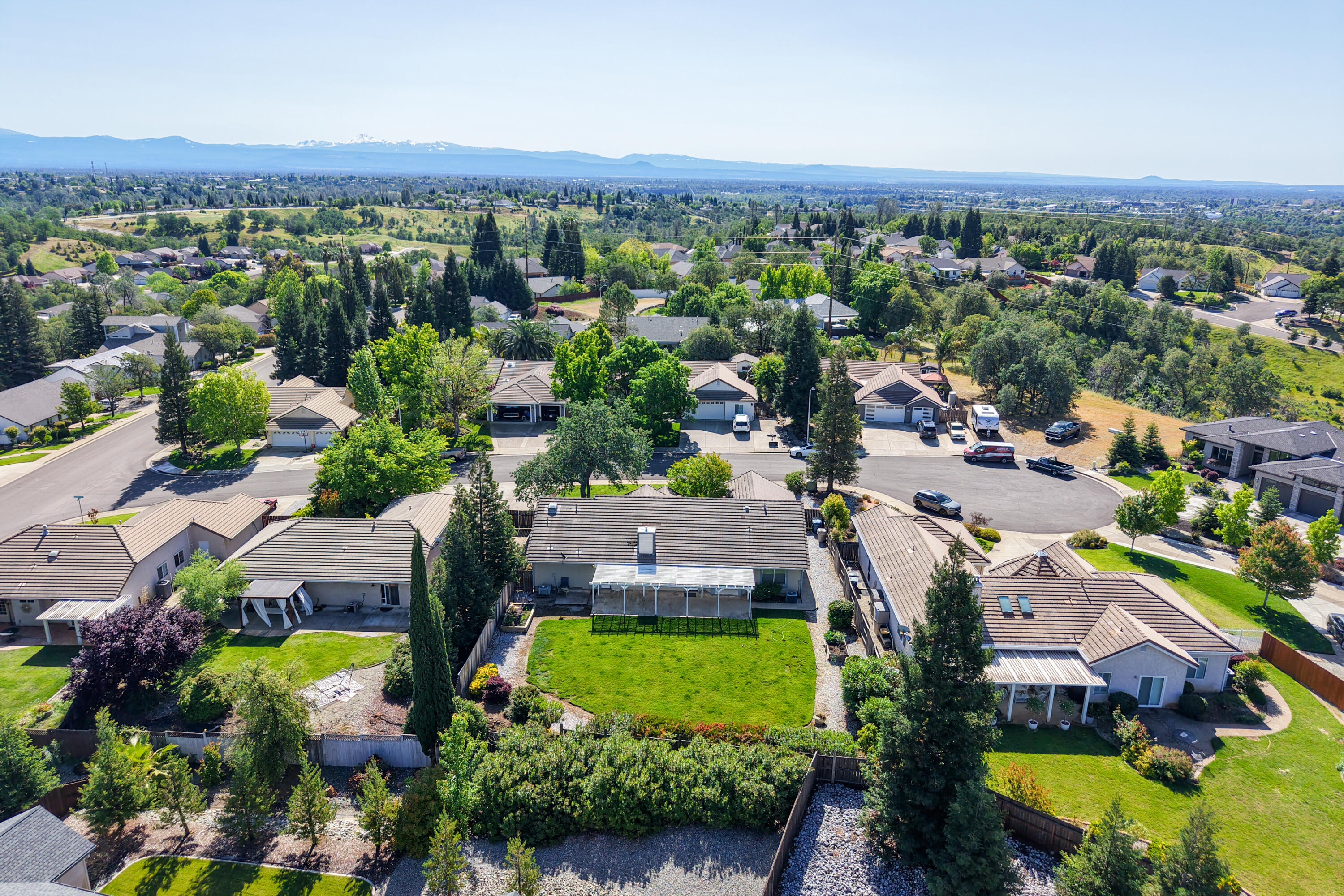 3438 Showboat Court Redding, CA 96003 - Photo 60 of 63 an aerial view of a house with a garden