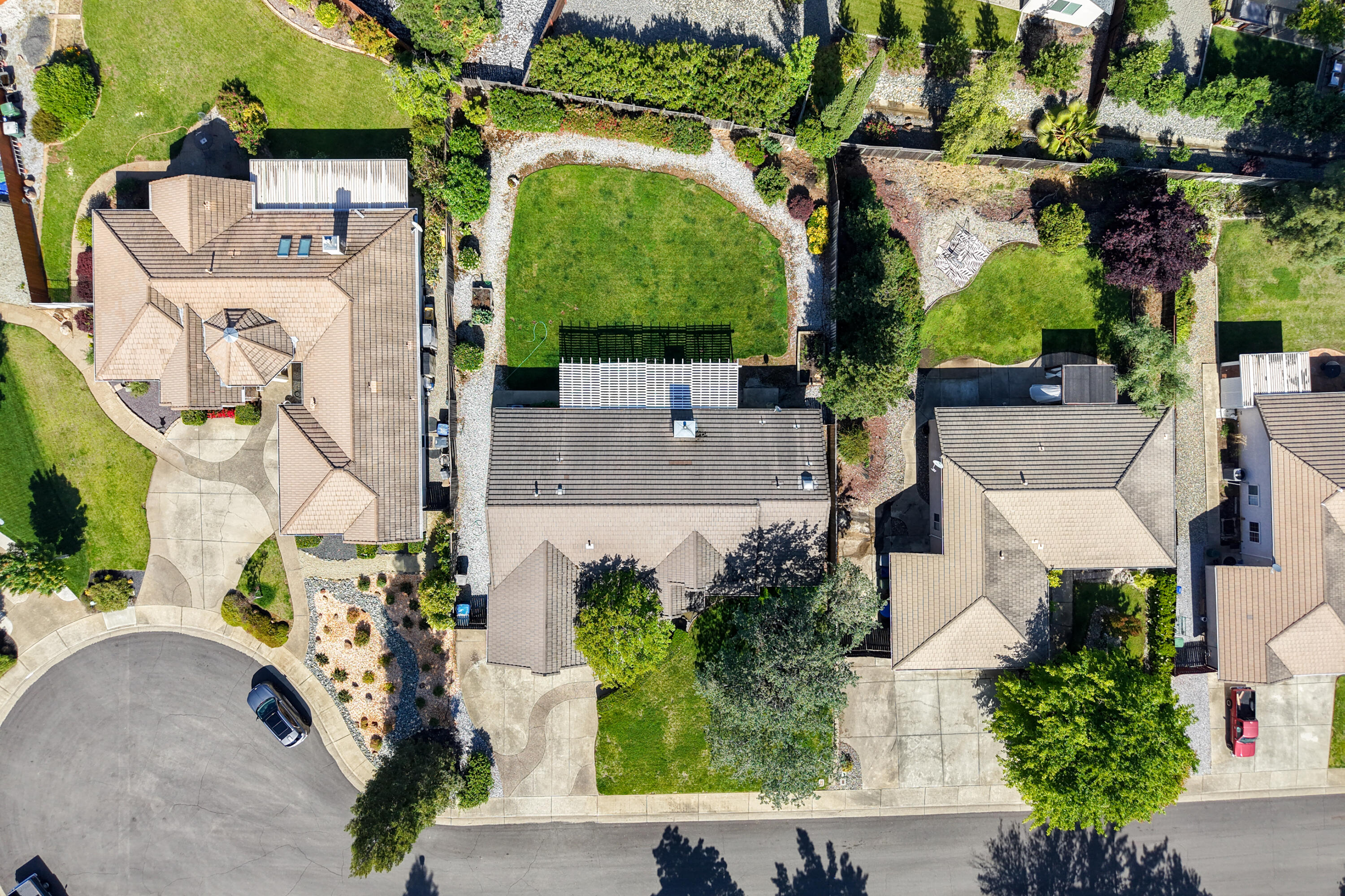 3438 Showboat Court Redding, CA 96003 - Photo 62 of 63 an aerial view of a house with a yard and a fountain