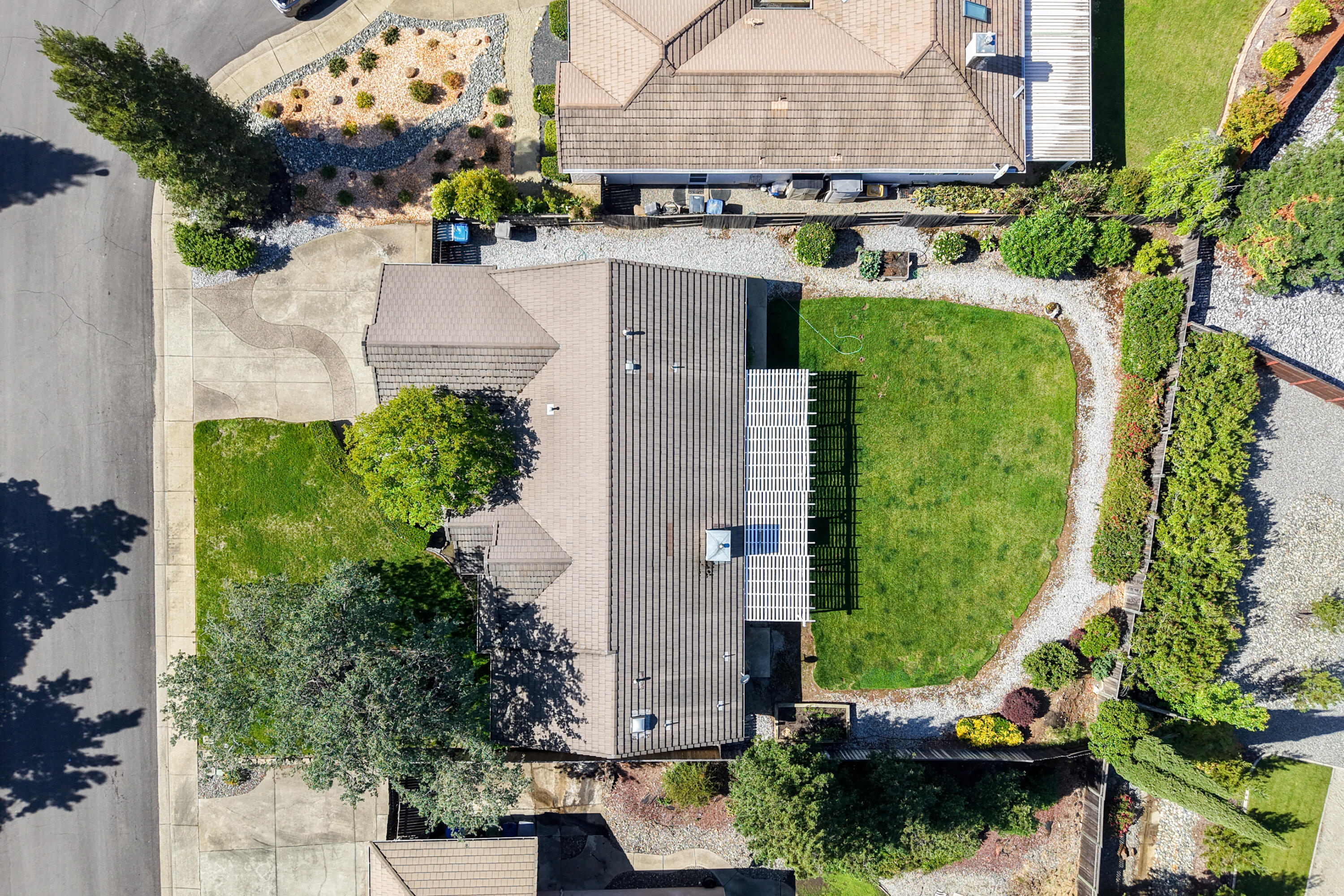 3438 Showboat Court Redding, CA 96003 - Photo 63 of 63 an aerial view of multiple houses with outdoor space