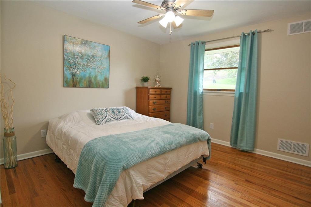 538 Center Church Road Canonsburg, PA 15317 - Photo 18 of 25 Bedroom 2 with hardwood flooring, a double closet and lighted ceiling fan...