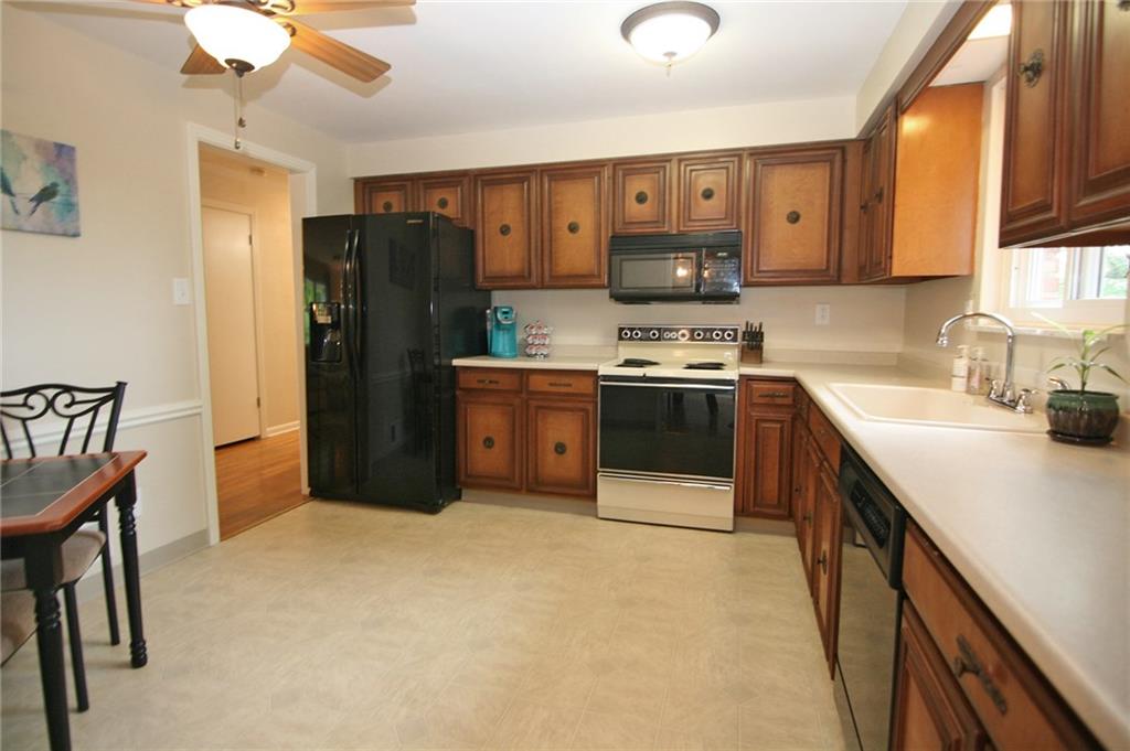538 Center Church Road Canonsburg, PA 15317 - Photo 9 of 25 The spacious kitchen has abundant wood cabinetry and solid surface counter top space!
