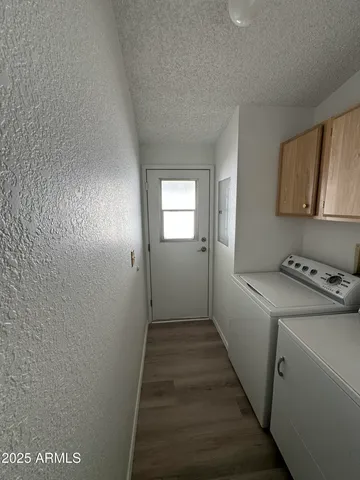 a view of a utility room with washer and dryer