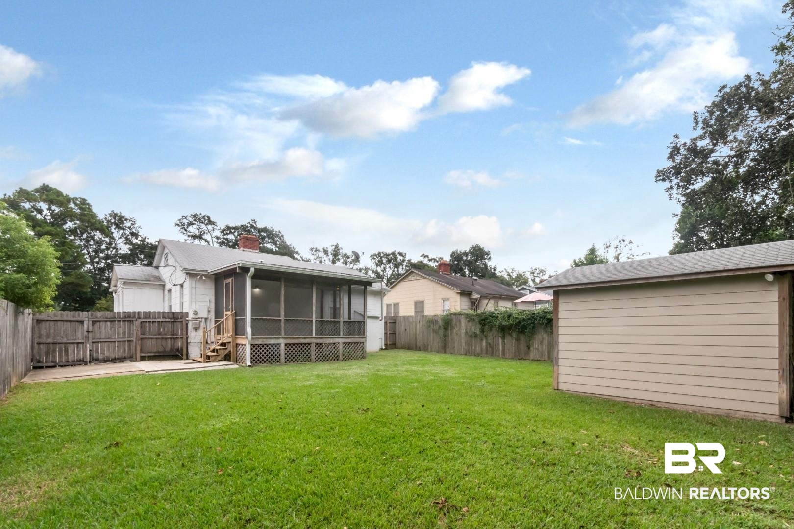208 Morgan Avenue Mobile, AL 36606 - Photo 20 of 27 View of yard with a sunroom