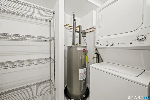 a view of a storage & utility room with washer and dryer