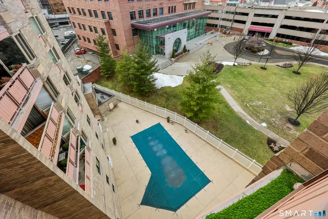 a view of balcony with furniture