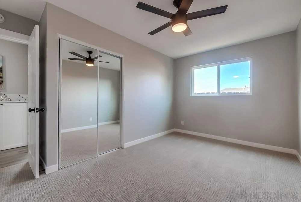9136 Northcote Road Santee, CA 92071 - Photo 13 of 33 a view of an empty room with a window