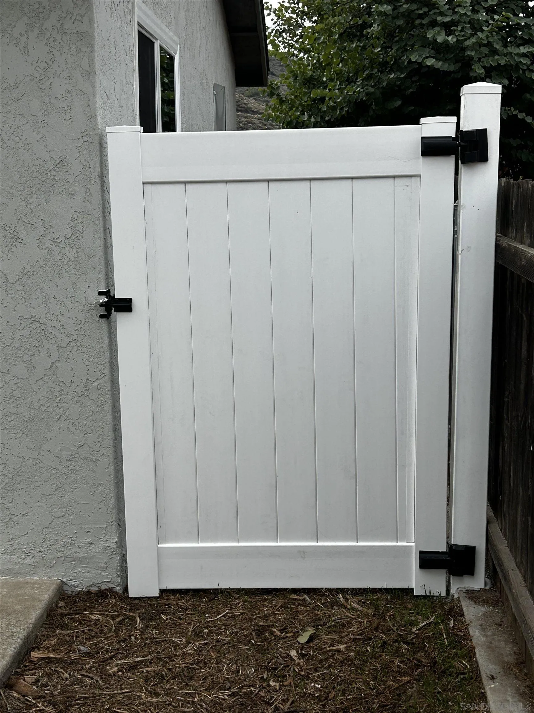9136 Northcote Road Santee, CA 92071 - Photo 28 of 33 a view of a wooden door