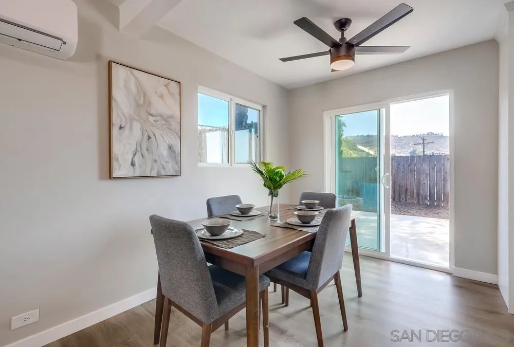 9136 Northcote Road Santee, CA 92071 - Photo 5 of 33 a view of a dining room with furniture window and wooden floor