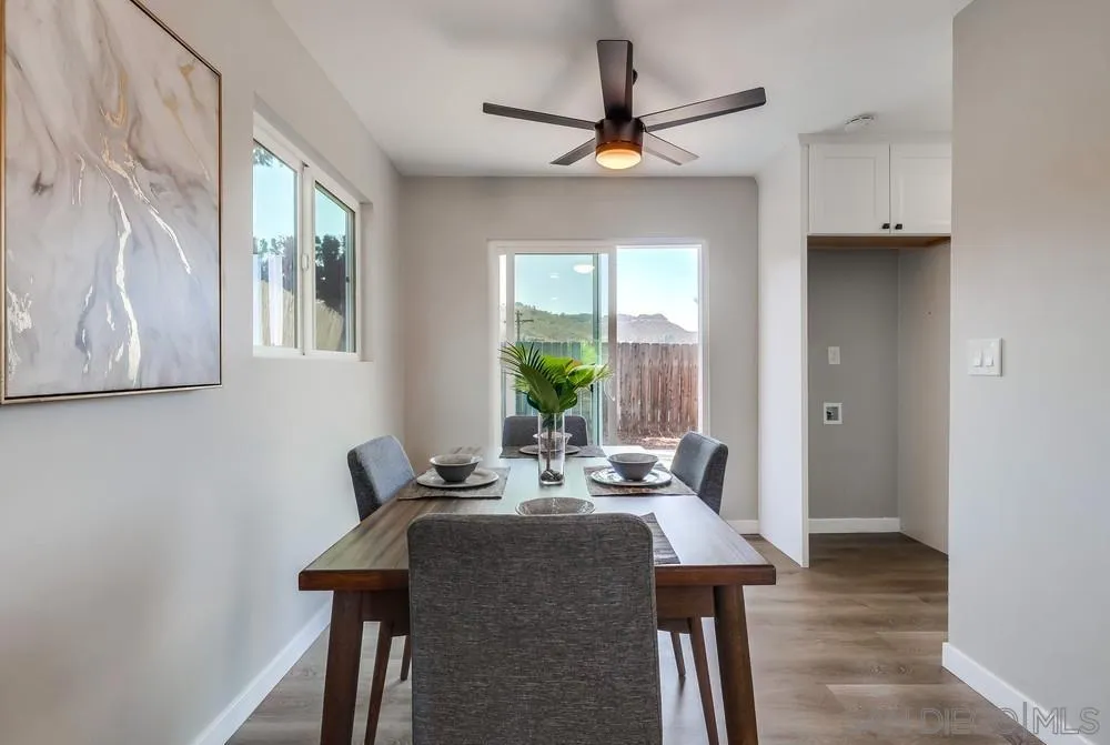9136 Northcote Road Santee, CA 92071 - Photo 6 of 33 a view of a dining room with furniture and a window