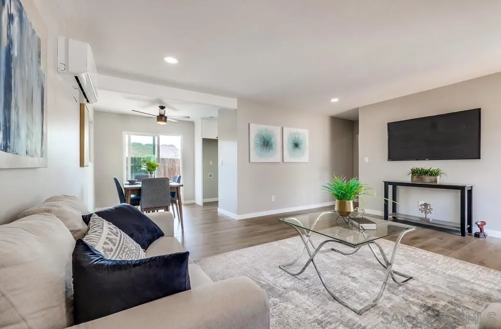 9136 Northcote Road Santee, CA 92071 - Photo 7 of 33 a living room with furniture and a flat screen tv