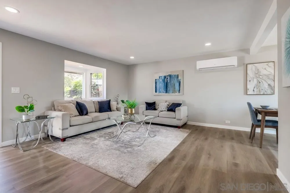 9136 Northcote Road Santee, CA 92071 - Photo 10 of 33 a living room with furniture and a wooden floor