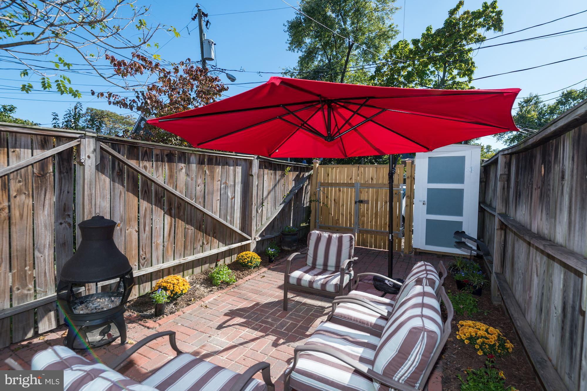 908 Pendleton Street Alexandria, VA 22314 - Photo 20 of 22 a view of deck with patio