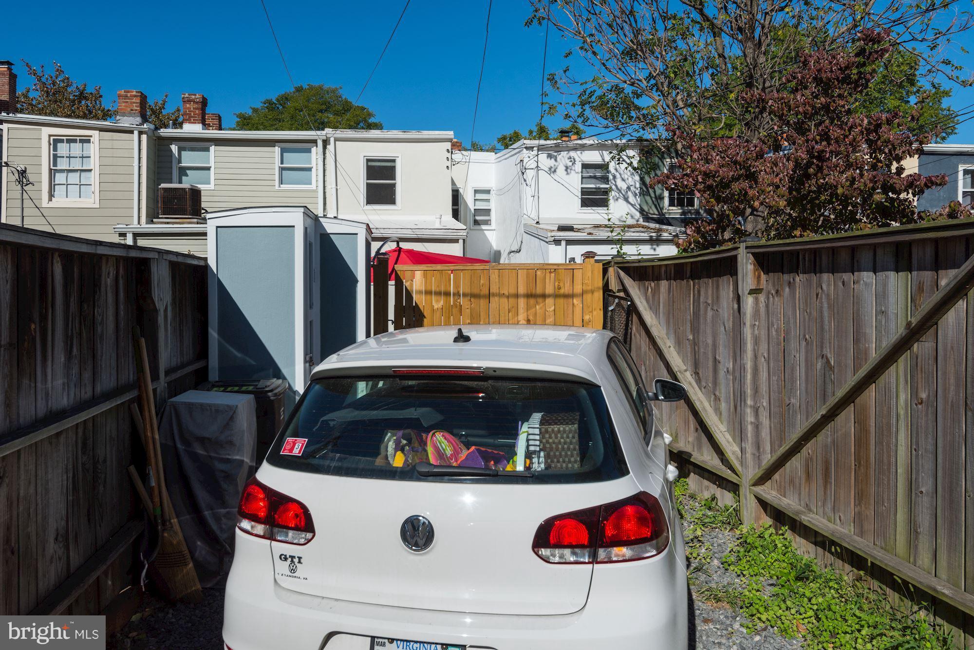 908 Pendleton Street Alexandria, VA 22314 - Photo 22 of 22 a view of roof deck with wooden fence and stairs