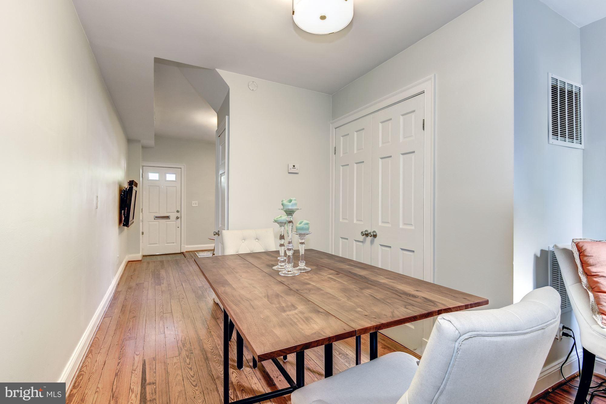 908 Pendleton Street Alexandria, VA 22314 - Photo 6 of 22 a view of a dining room with furniture