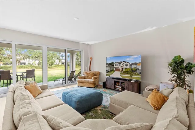 a bathroom with a double vanity sink mirror and shower