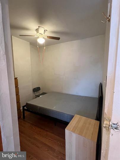 1121 Arlington Boulevard, Unit 947 Arlington, VA 22209 - Photo 11 of 11 a room with wooden floor and fan