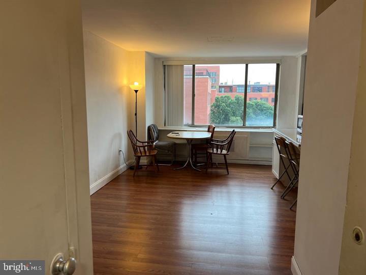 1121 Arlington Boulevard, Unit 947 Arlington, VA 22209 - Photo 6 of 11 a view of a workspace with furniture and a window