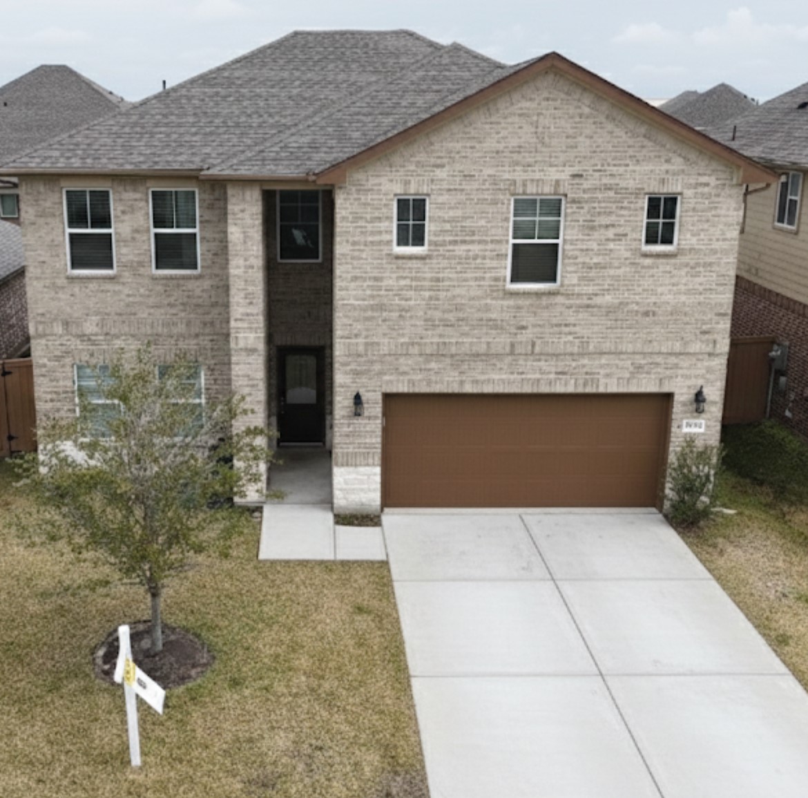 a front view of a house with yard