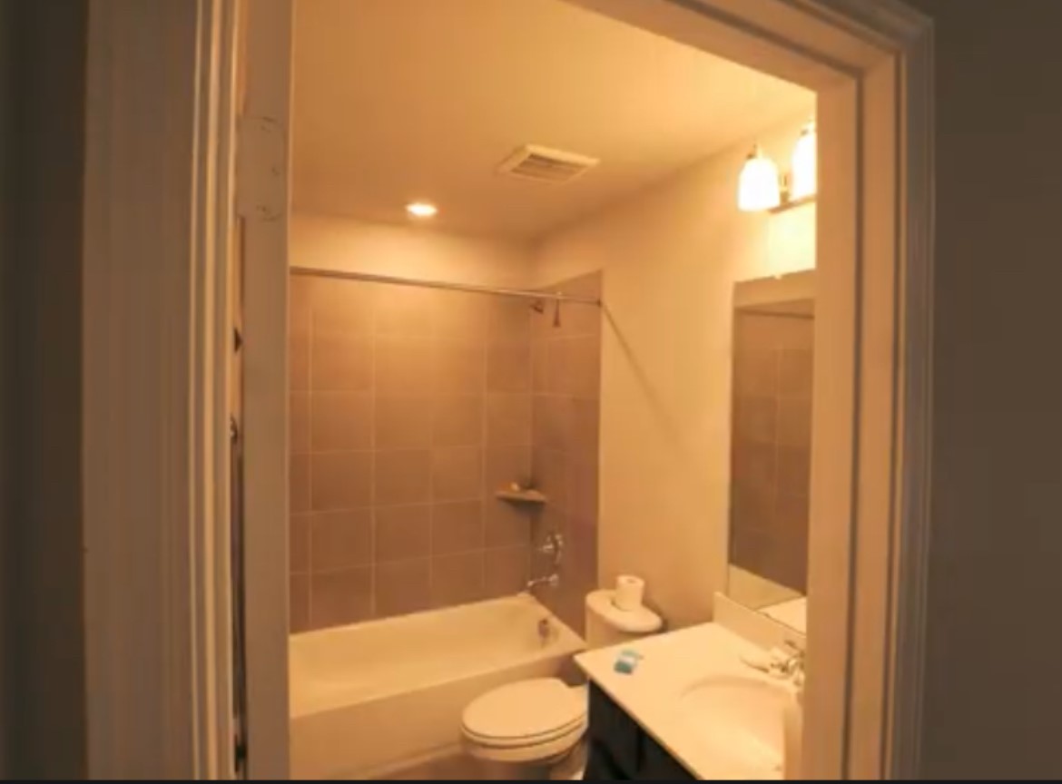 10831 Sugar Pne Lane Rosharon, TX 77583 - Photo 22 of 23 a bathroom with a sink a toilet and shower