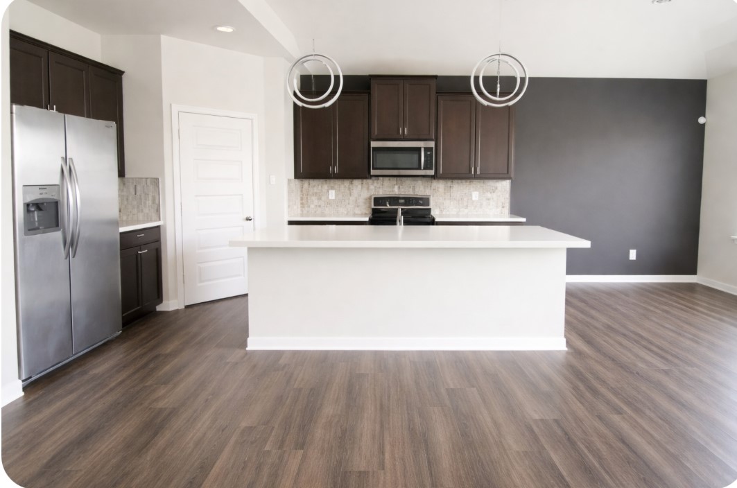 10831 Sugar Pne Lane Rosharon, TX 77583 - Photo 8 of 23 a view of a kitchen with wooden floor