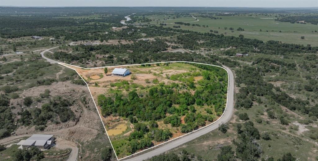 467 Weatherby Way Santo, TX 76472 - Photo 1 of 28 an aerial view of mountain with yard