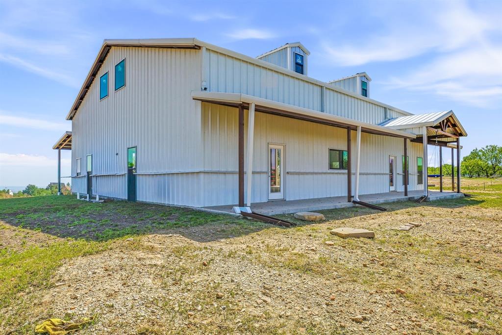 467 Weatherby Way Santo, TX 76472 - Photo 12 of 28 a view of a back yard of the house