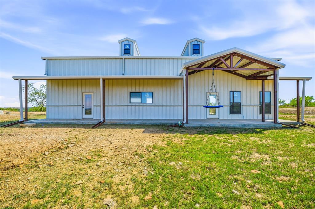 467 Weatherby Way Santo, TX 76472 - Photo 13 of 28 a front view of a house with a yard