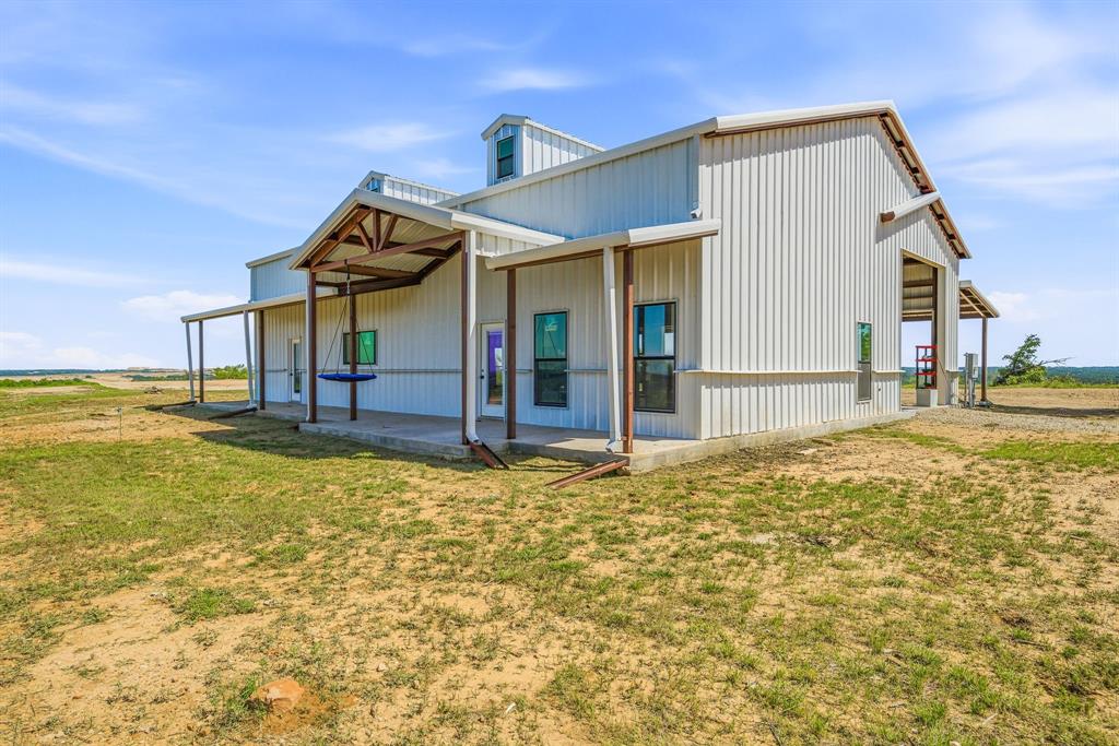 467 Weatherby Way Santo, TX 76472 - Photo 14 of 28 a view of a house with a swimming pool