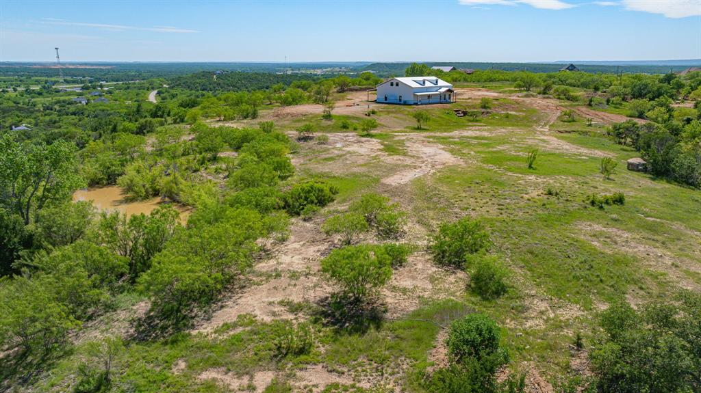 467 Weatherby Way Santo, TX 76472 - Photo 19 of 28 a view of a lake with an outdoor space