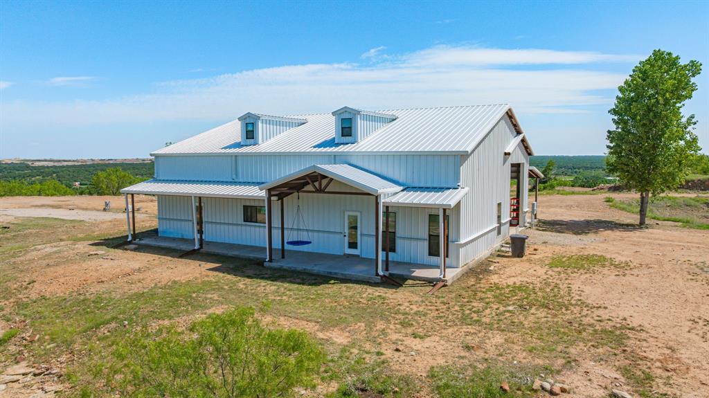 467 Weatherby Way Santo, TX 76472 - Photo 2 of 28 a house view with a backyard space