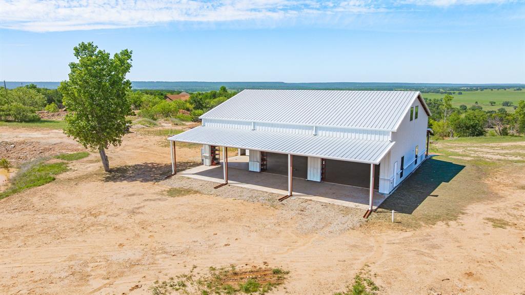 467 Weatherby Way Santo, TX 76472 - Photo 5 of 28 a view of a terrace with a bench