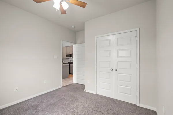 an empty room with fan