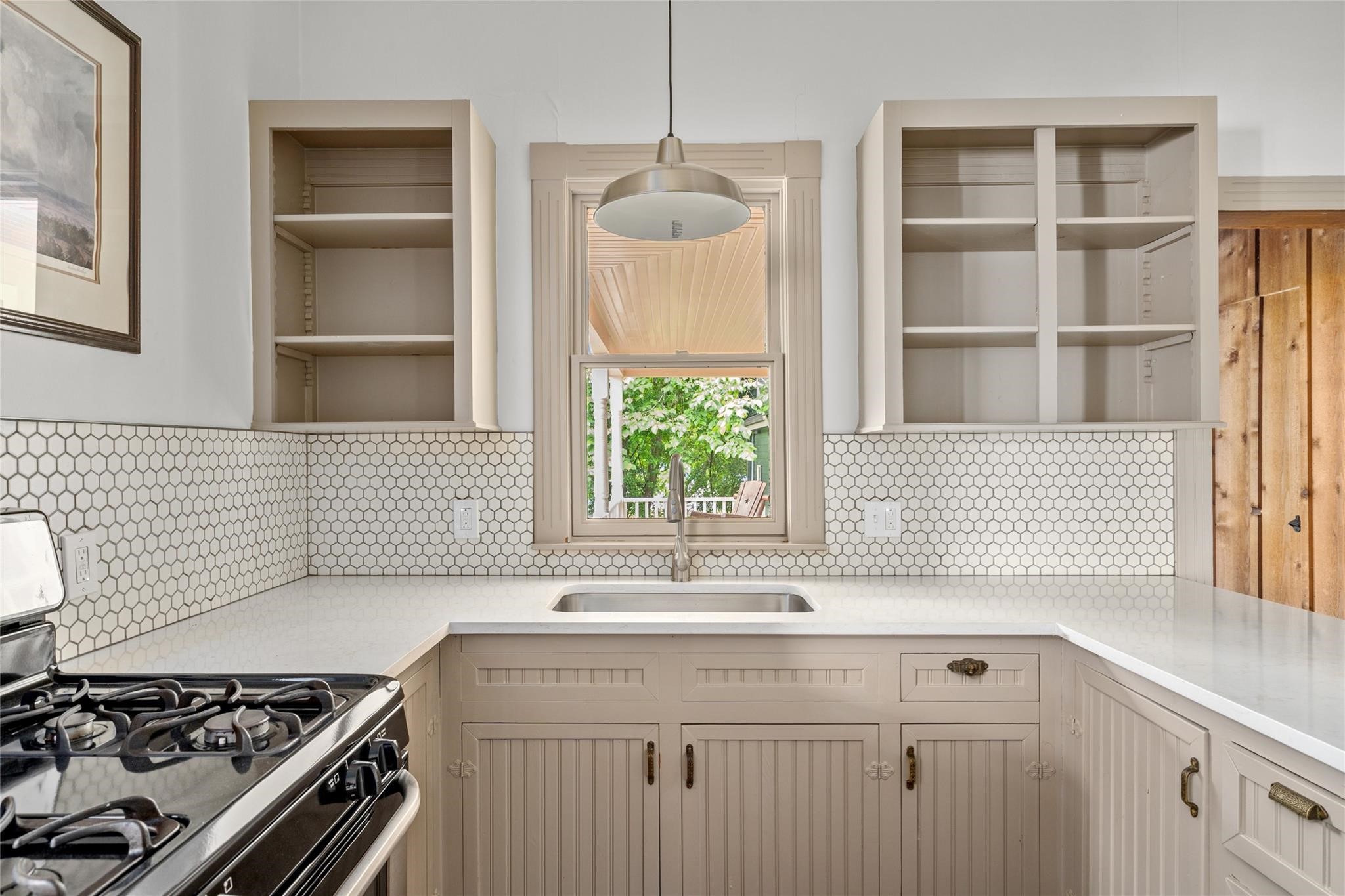 806 East Main Street Bellville, TX 77418 - Photo 11 of 38 a kitchen with a stove and a window