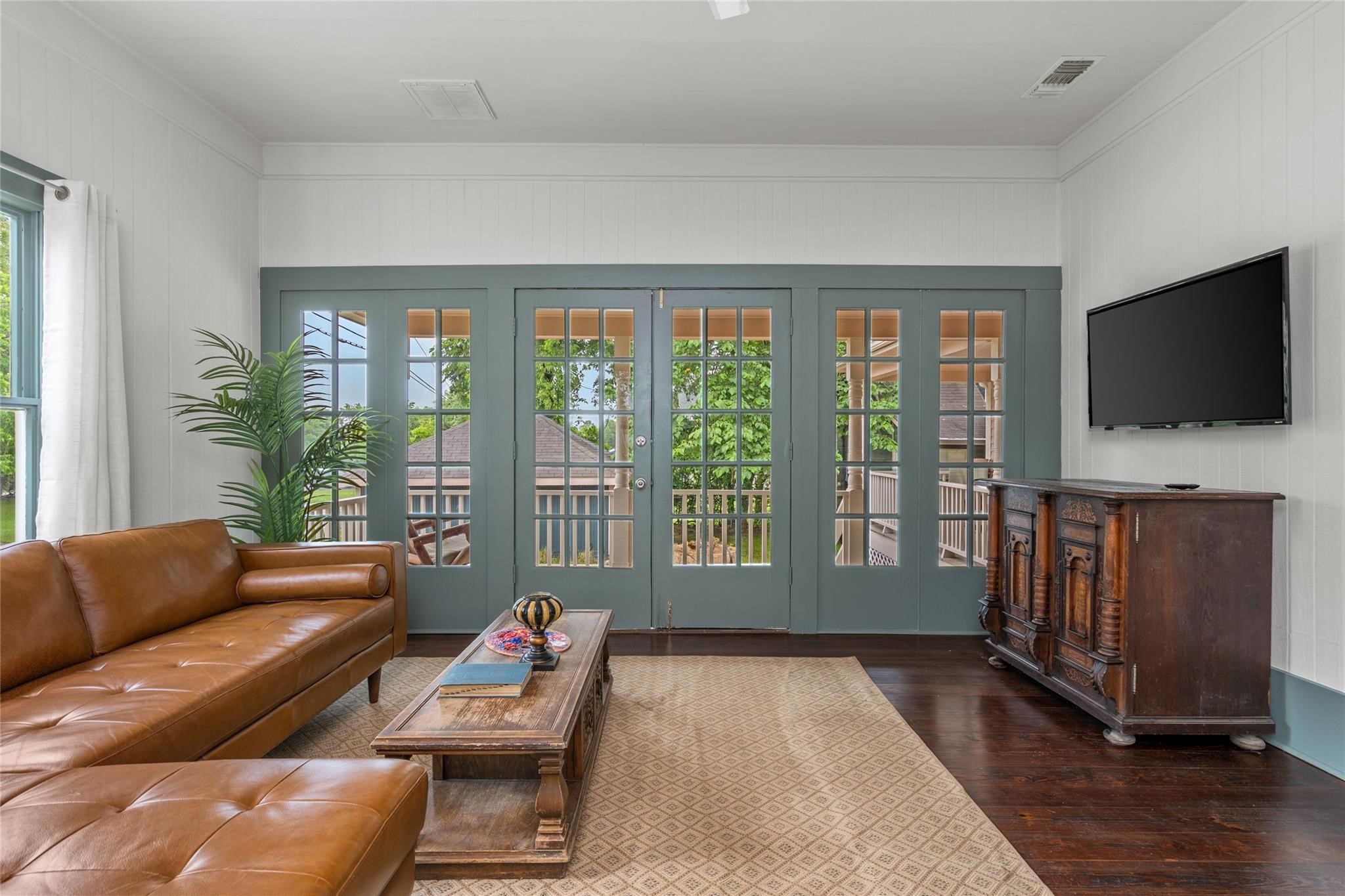 806 East Main Street Bellville, TX 77418 - Photo 17 of 38 a living room with furniture and a flat screen tv