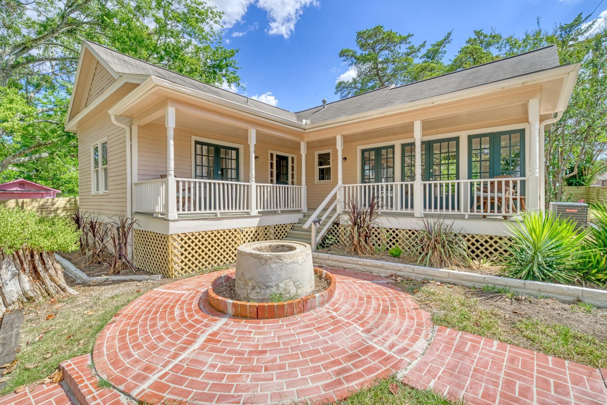 806 East Main Street Bellville, TX 77418 - Photo 2 of 38 a front view of a house with a yard