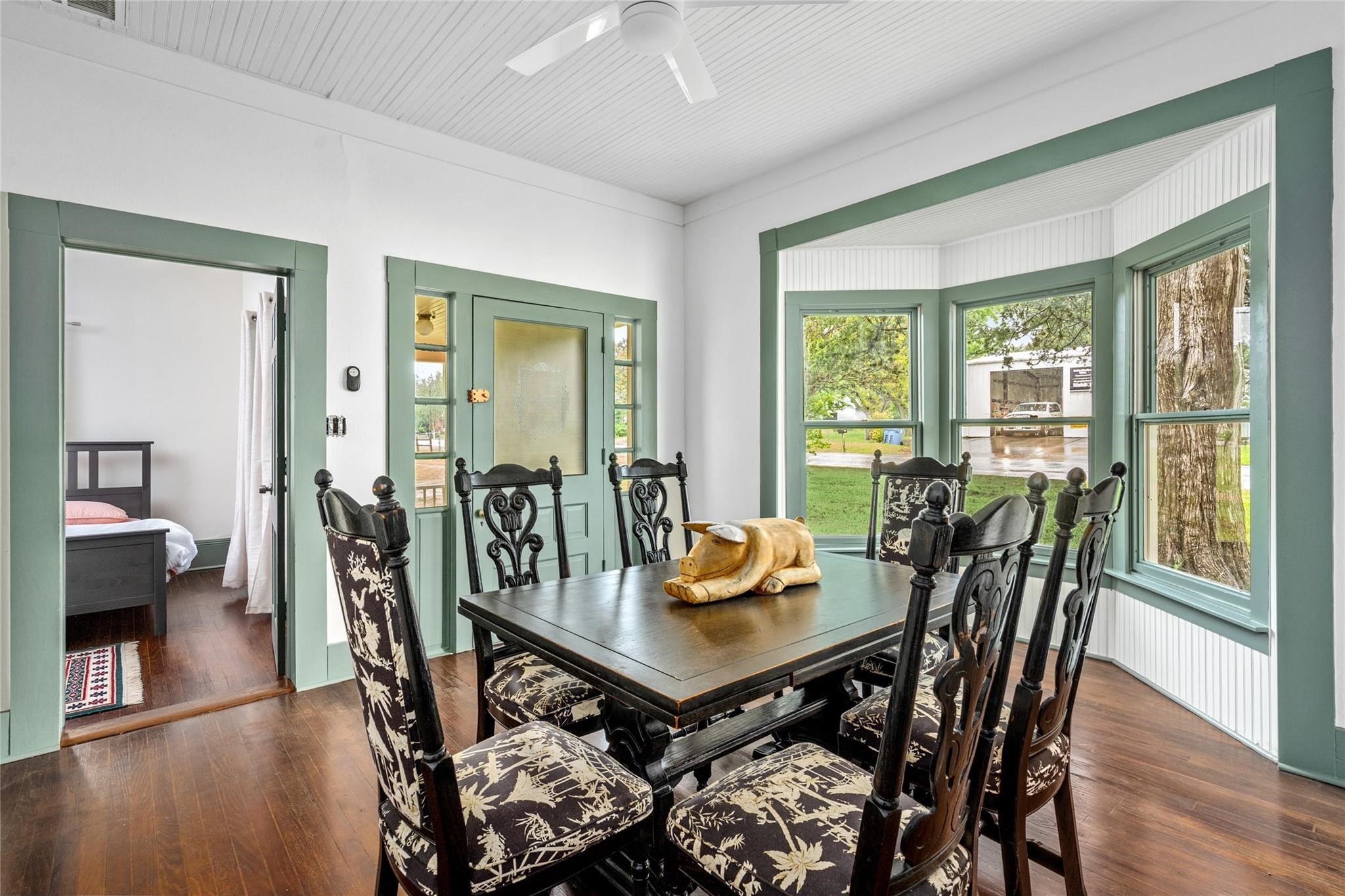 806 East Main Street Bellville, TX 77418 - Photo 21 of 38 a view of a dining room with furniture window and wooden floor