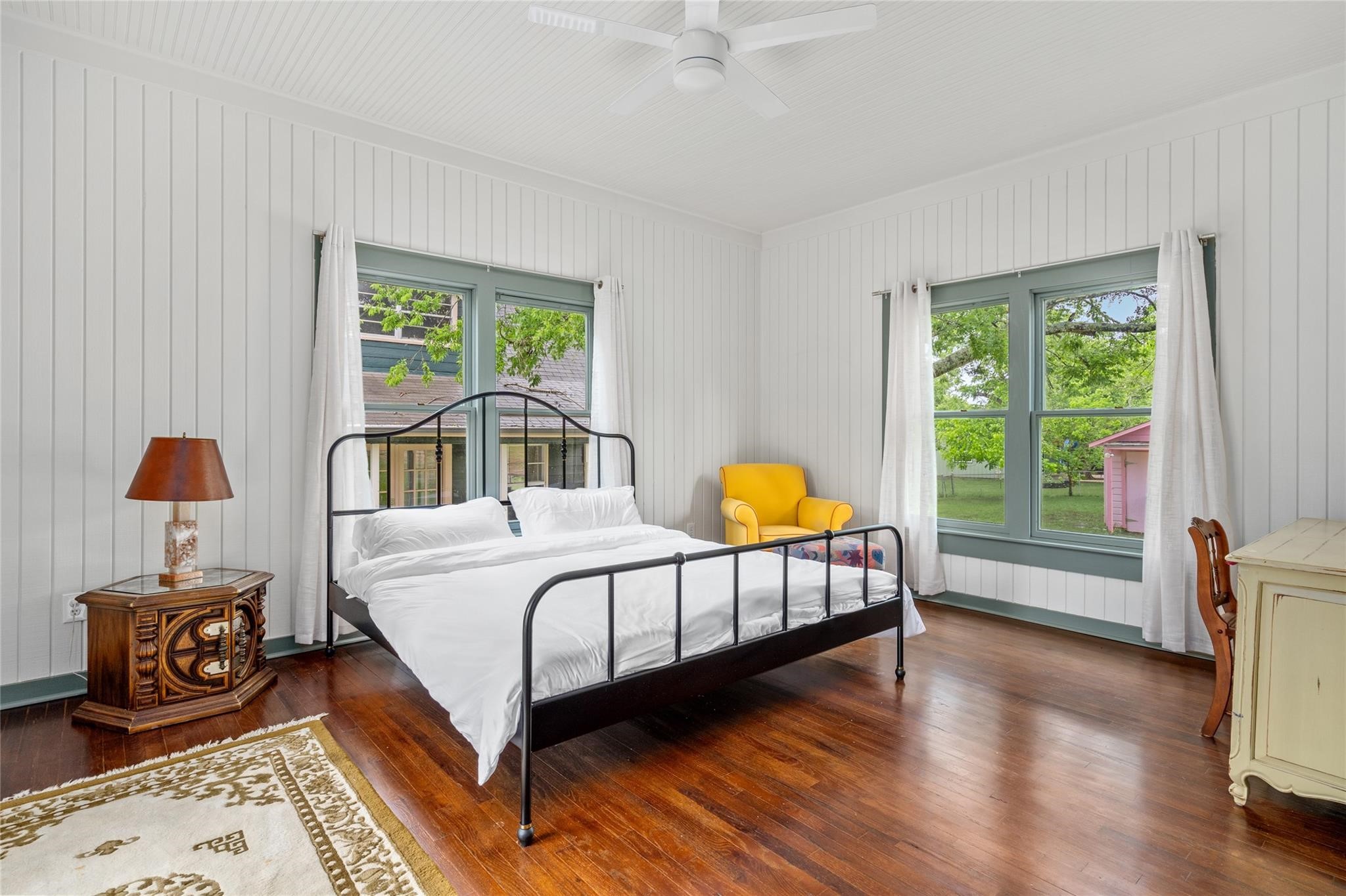 806 East Main Street Bellville, TX 77418 - Photo 26 of 38 a bedroom with a bed and wooden floor